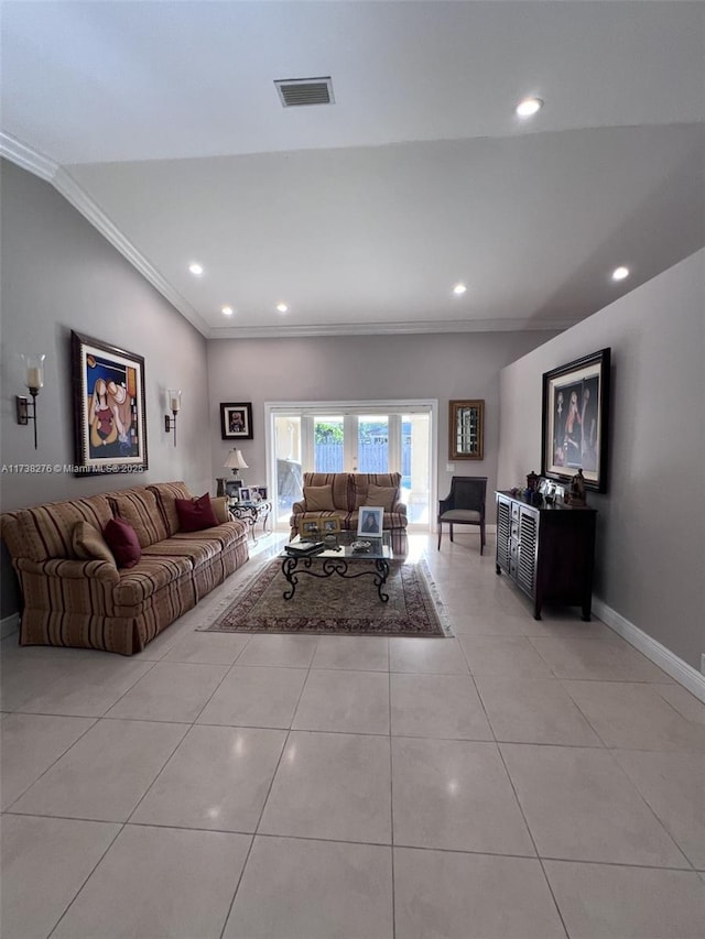 unfurnished living room with crown molding, vaulted ceiling, and light tile patterned flooring