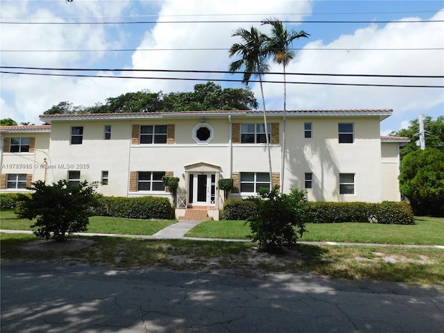 view of front of house with a front lawn