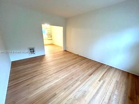 empty room featuring light hardwood / wood-style floors