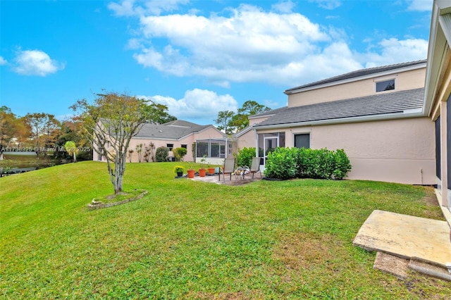 view of yard with a patio area