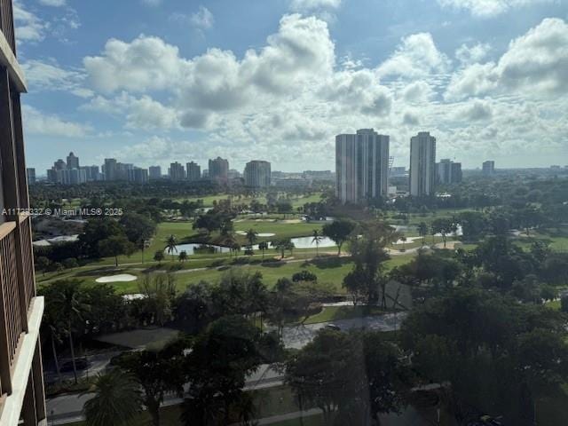 property's view of city featuring a water view