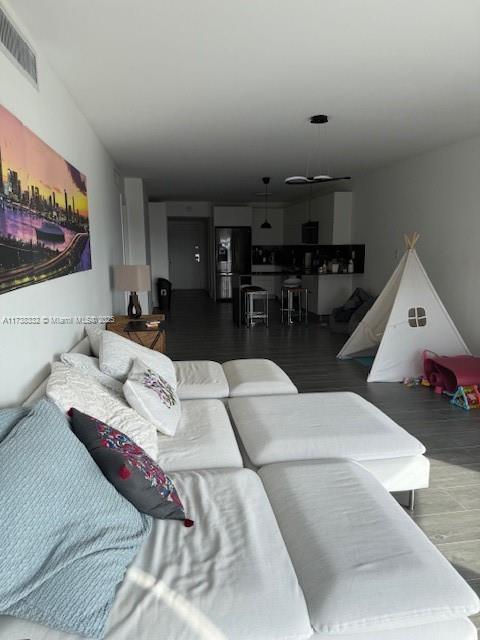 living room featuring hardwood / wood-style floors