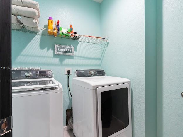 laundry area featuring washer and dryer