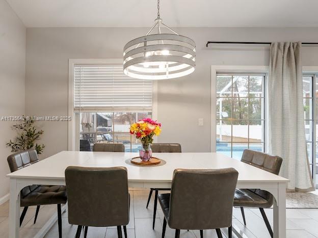 dining room featuring an inviting chandelier