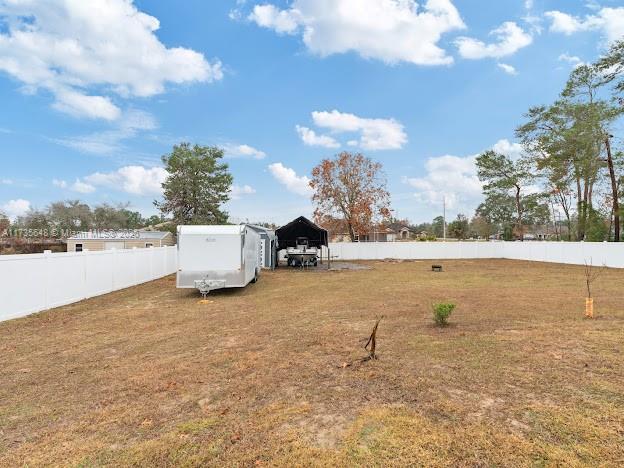 view of yard featuring a carport