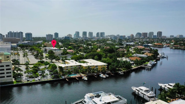 birds eye view of property featuring a water view