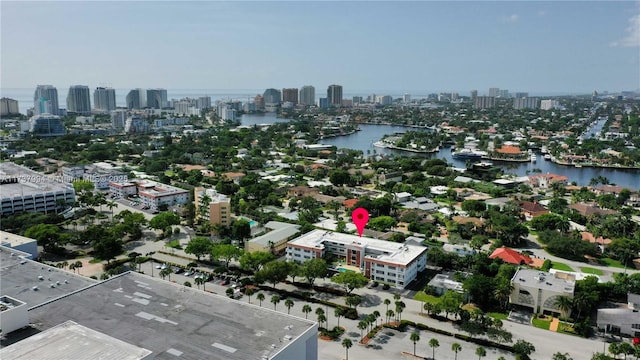 birds eye view of property featuring a water view