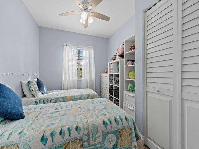 bedroom featuring ceiling fan