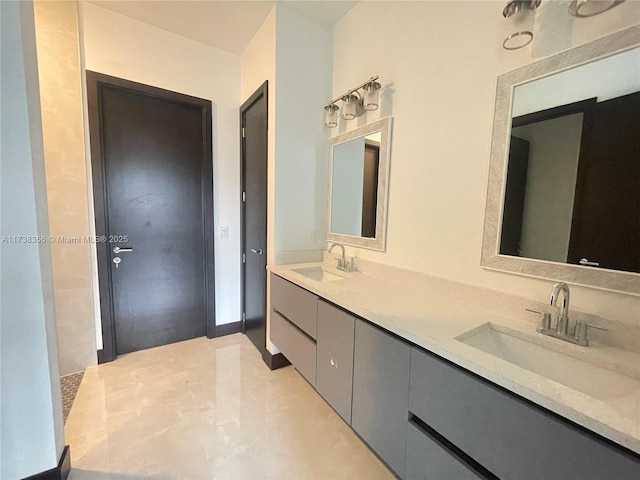 bathroom featuring double vanity and a sink