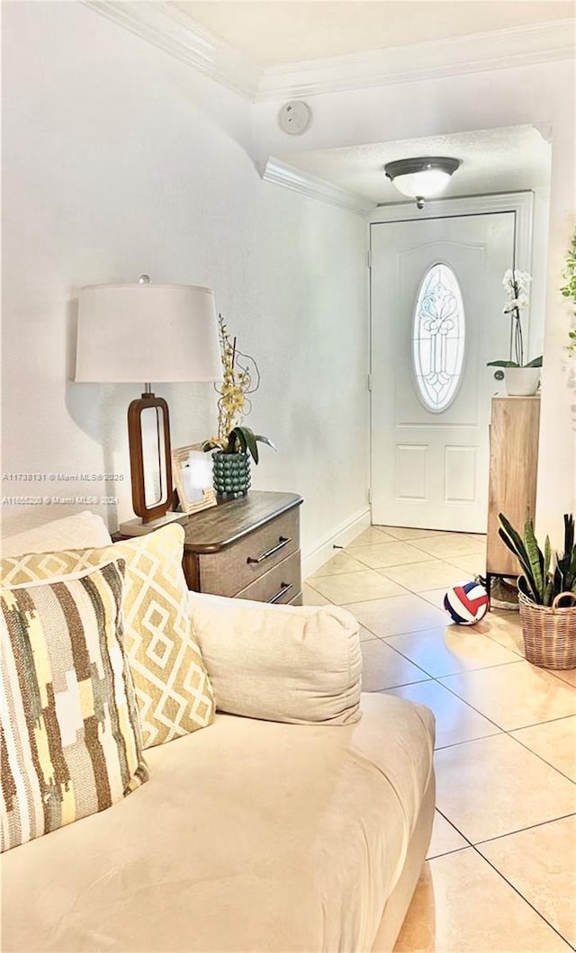 tiled entrance foyer with ornamental molding