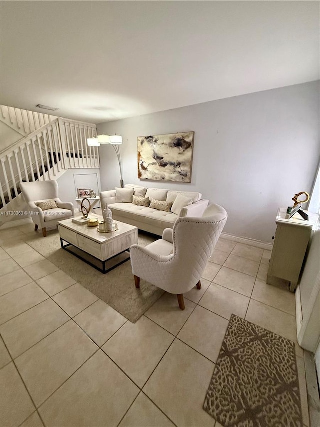 living room with light tile patterned flooring