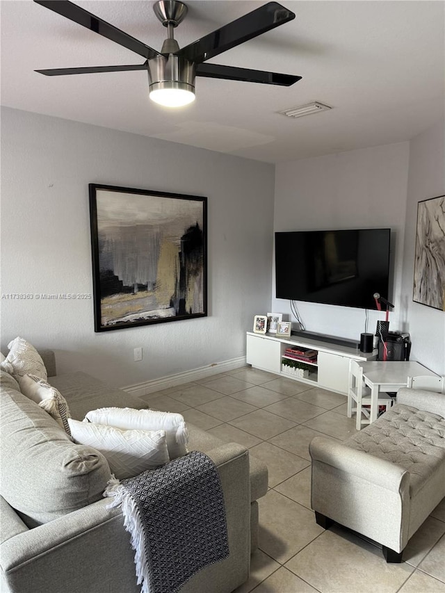 living room with tile patterned floors