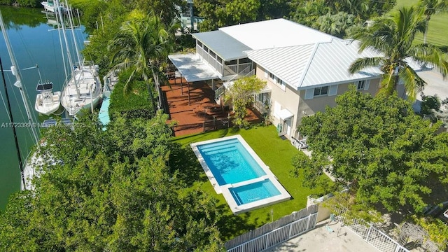 drone / aerial view with a water view