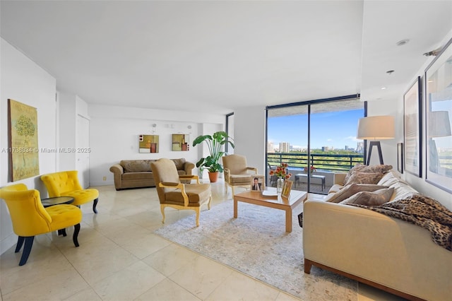 tiled living room with floor to ceiling windows