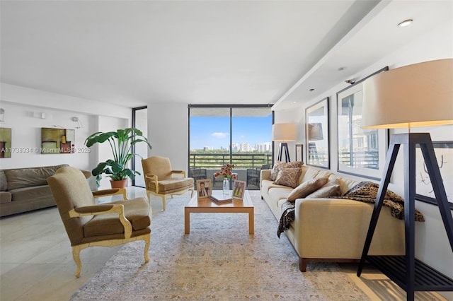 living room featuring a wall of windows