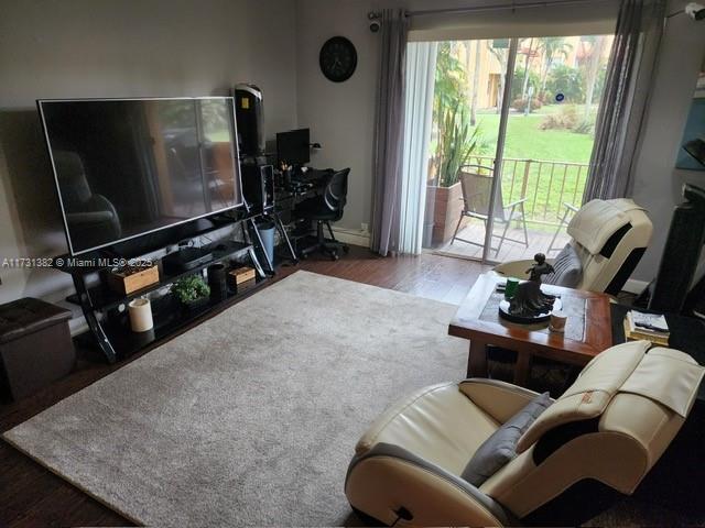 living room with dark wood-type flooring