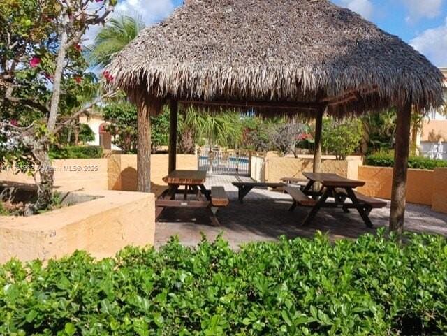 view of property's community featuring a gazebo and a patio area