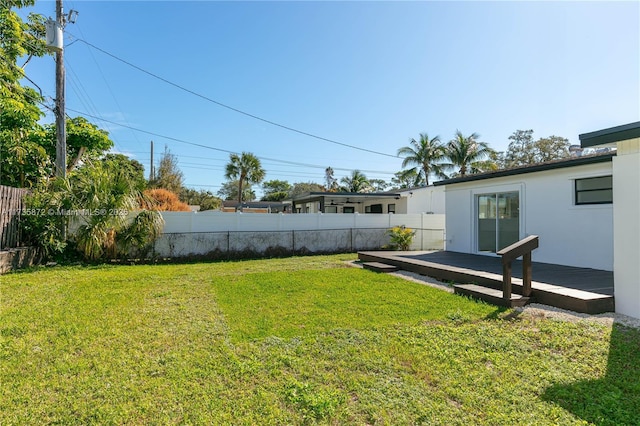 view of yard with a deck