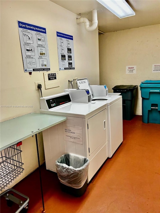 laundry area featuring washer and clothes dryer