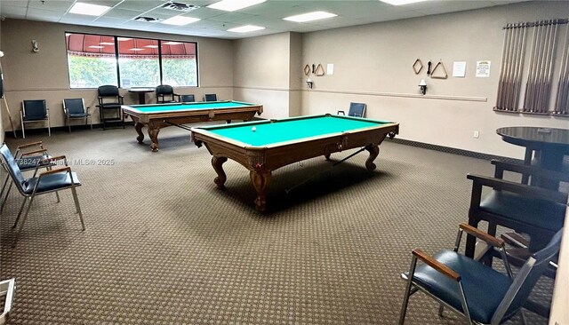 recreation room with carpet floors, a paneled ceiling, and pool table