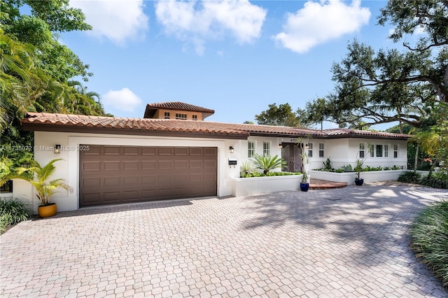 view of front of property featuring a garage