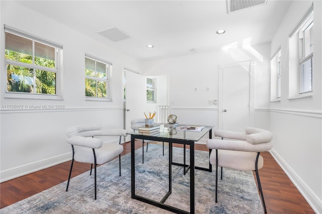 home office with hardwood / wood-style floors