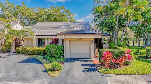 view of front of property with a garage