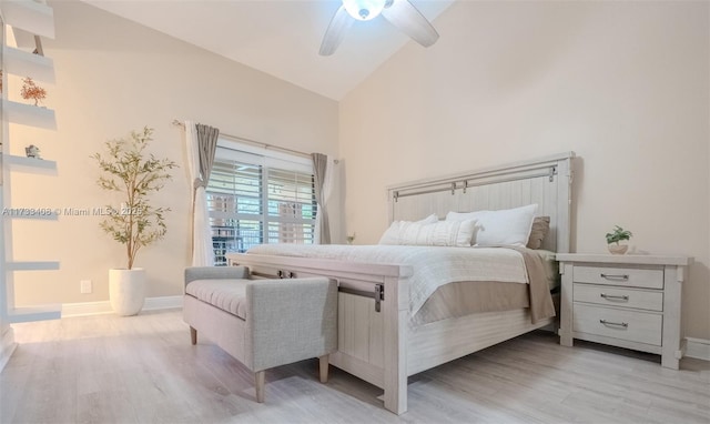 bedroom featuring high vaulted ceiling, ceiling fan, and light hardwood / wood-style flooring