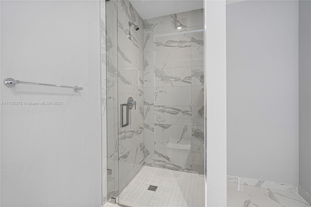 bathroom with a stall shower