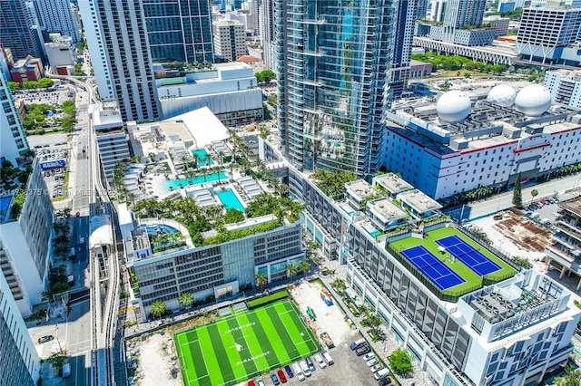 birds eye view of property with a city view