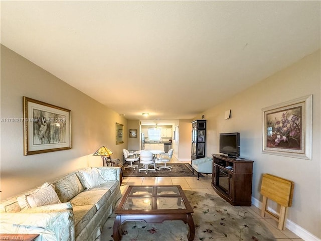 living room with light tile patterned flooring