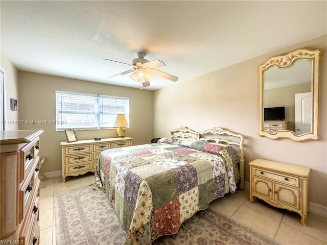 6777 Winkler Rd Unit A160, Fort Myers, FL 33919 - bedroom featuring light tile patterned floors, baseboards, and ceiling fan