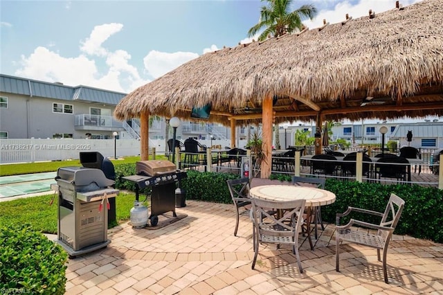 view of patio / terrace featuring a gazebo and grilling area