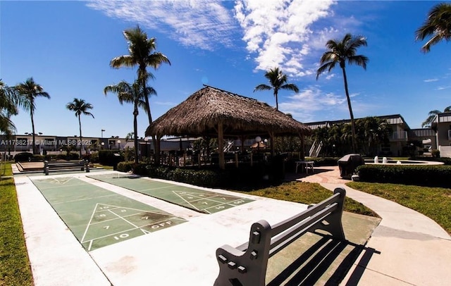 6777 Winkler Rd Unit A160, Fort Myers, FL 33919 - surrounding community featuring a gazebo, shuffleboard, and a residential view