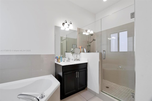 bathroom featuring vanity, tile patterned floors, and plus walk in shower