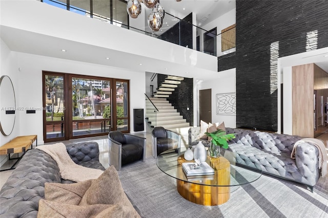 living room featuring a high ceiling