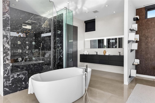 bathroom featuring vanity and shower with separate bathtub