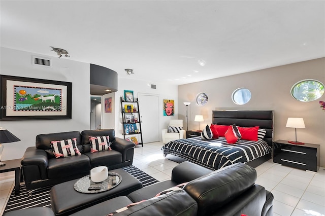 bedroom with light tile patterned flooring