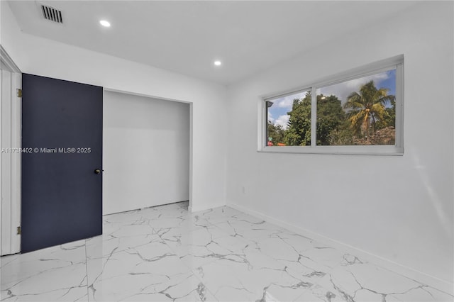 unfurnished bedroom featuring a closet