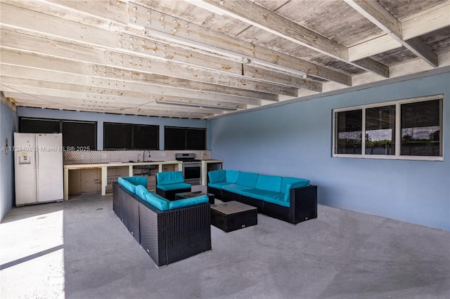 view of patio with sink and an outdoor hangout area