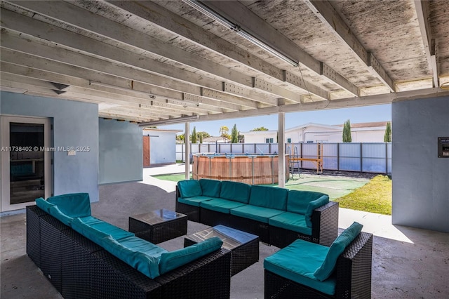 view of patio featuring an outdoor living space and a hot tub