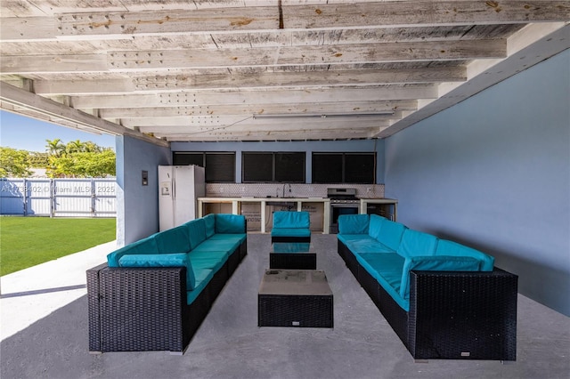 view of patio / terrace featuring area for grilling, sink, a pergola, and outdoor lounge area