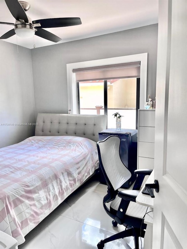 bedroom featuring ceiling fan