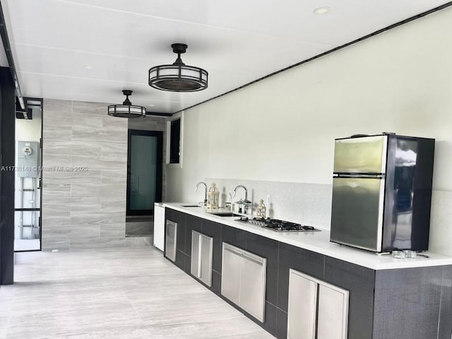 kitchen with sink and stainless steel appliances