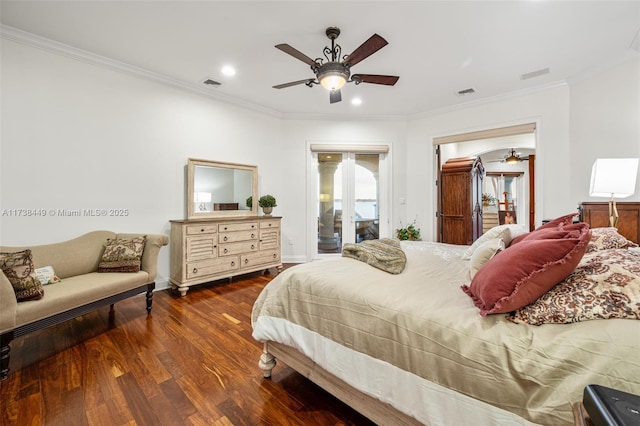 bedroom featuring ornamental molding, dark hardwood / wood-style floors, and ceiling fan