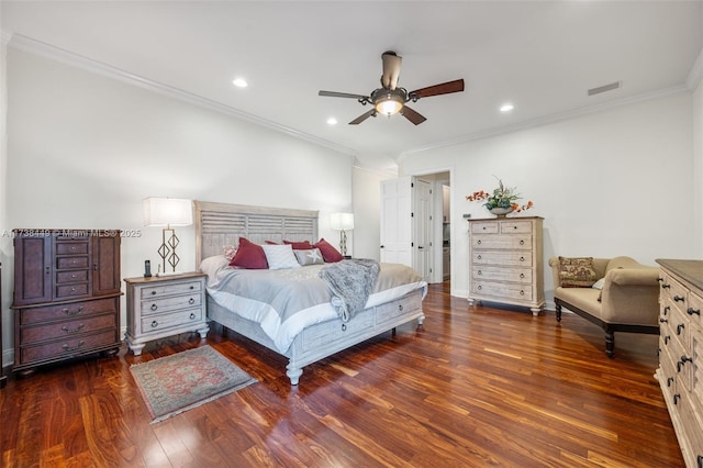 bedroom featuring crown molding, dark wood-type flooring, and ceiling fan