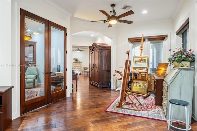 hall featuring ornamental molding, dark hardwood / wood-style floors, and french doors