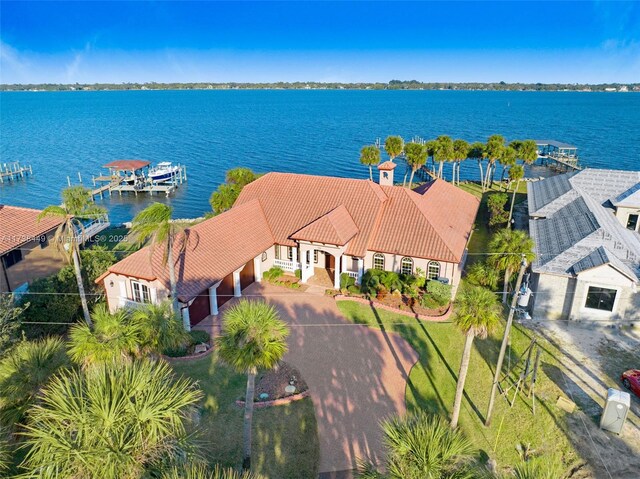 birds eye view of property featuring a water view