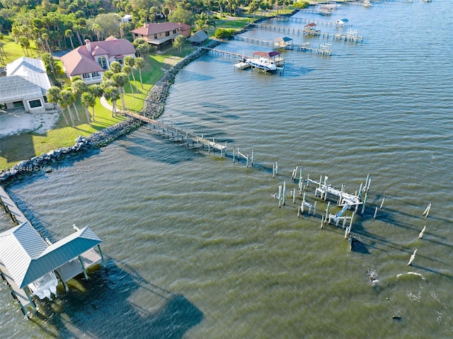 bird's eye view with a water view