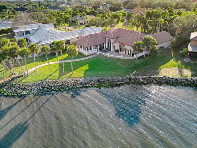 bird's eye view with a water view